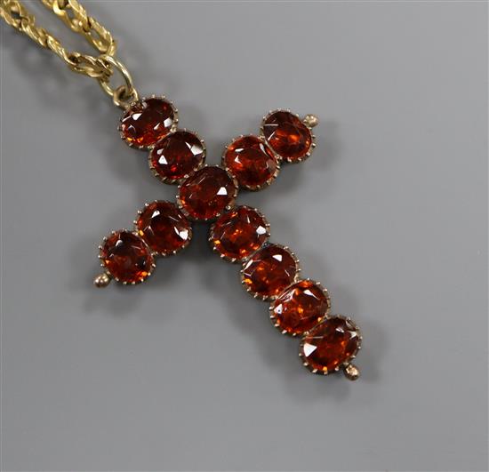 An Italian 9ct gold flattened curblink chain and an antique paste set gold backed cross pendant